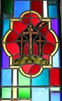 Stained glass cross in worship area